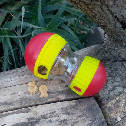 Dog playing with Tumbly interactive treat dispensing toy